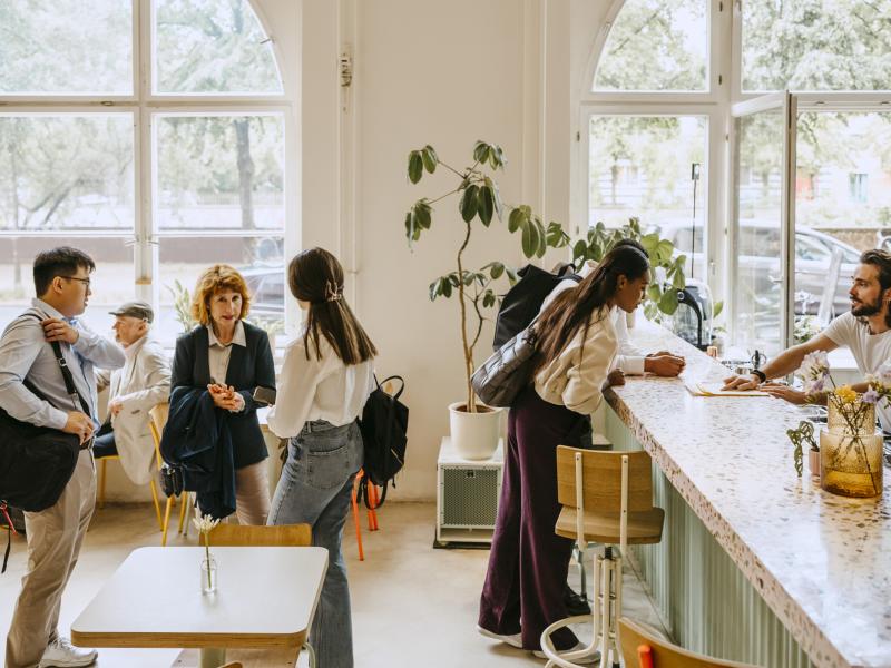 Customers queueing in a restaurant