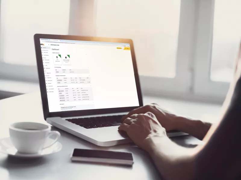 Multisite management software on a laptop