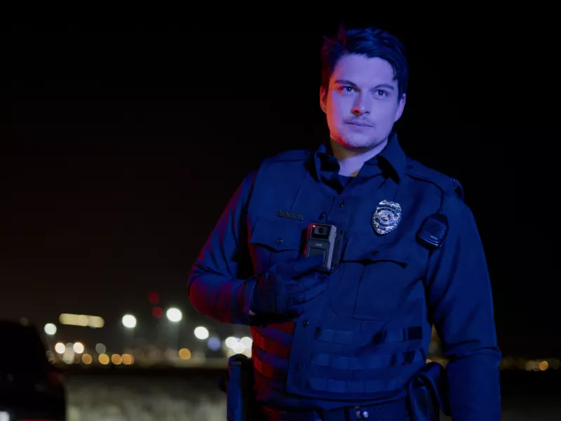 AXIS W120 Body Worn Camera policeman night