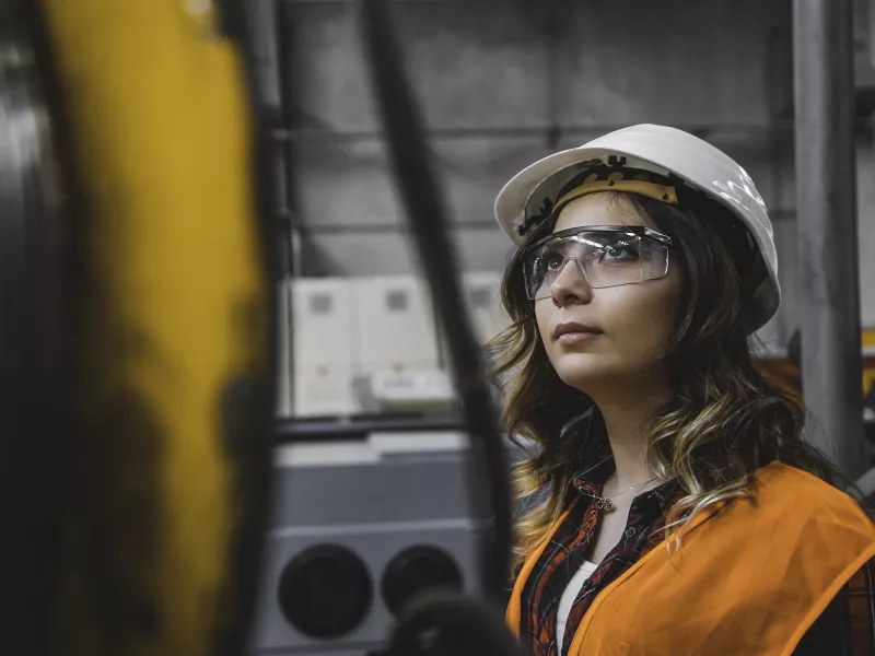 Woman in an industrial setting