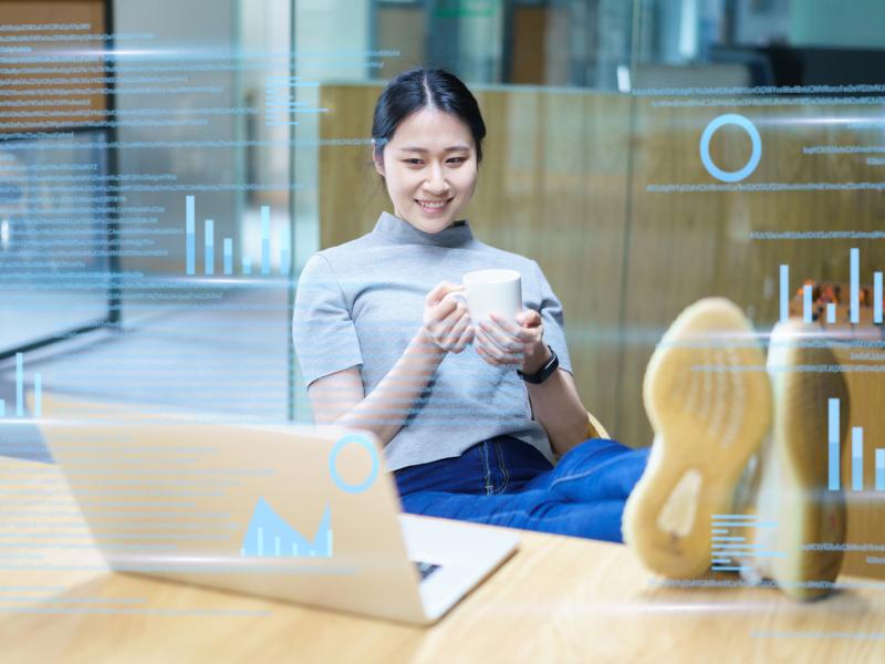 Woman sitting at her desk