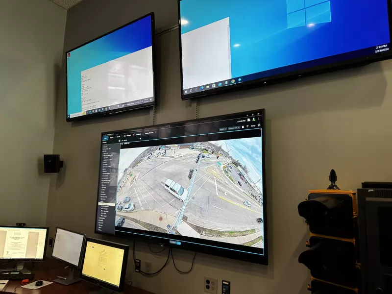 Monitors on wall