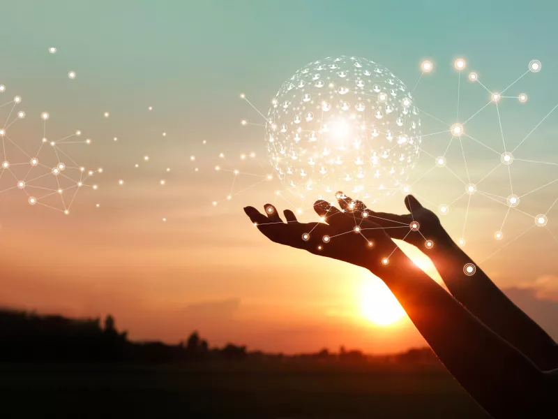 hands holding global networks connection symbolizing managed services