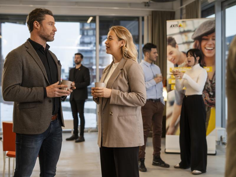 CPP man and woman discussing after presentation