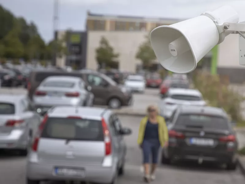 Network horn speaker in a parking lot