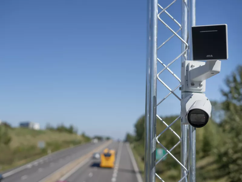 Axis bullet camera and radar mounted near highway