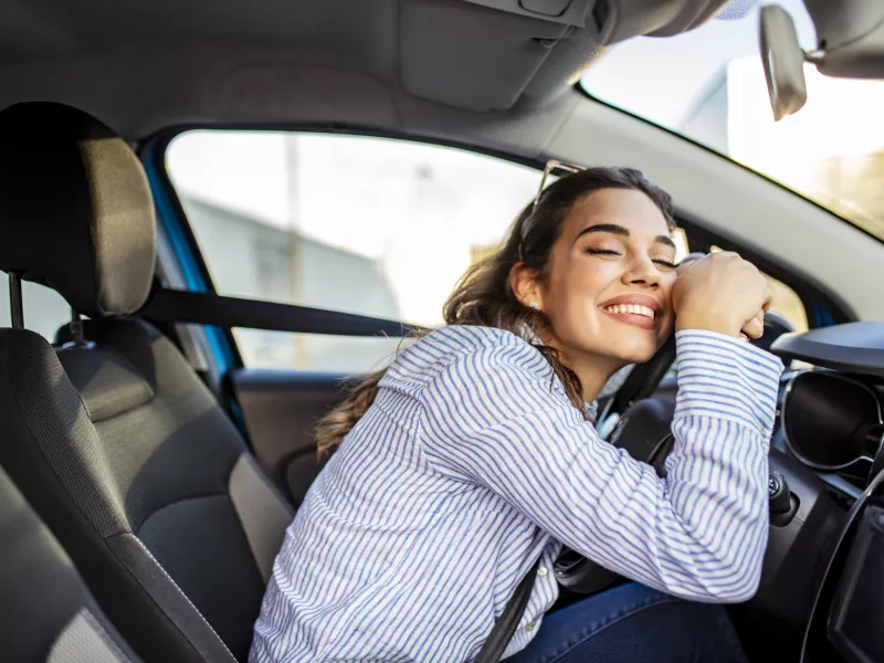 Woman smiling in car 