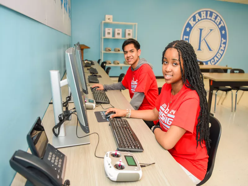 Two teens at computers at Boys & Girls Clubs of Carroll County