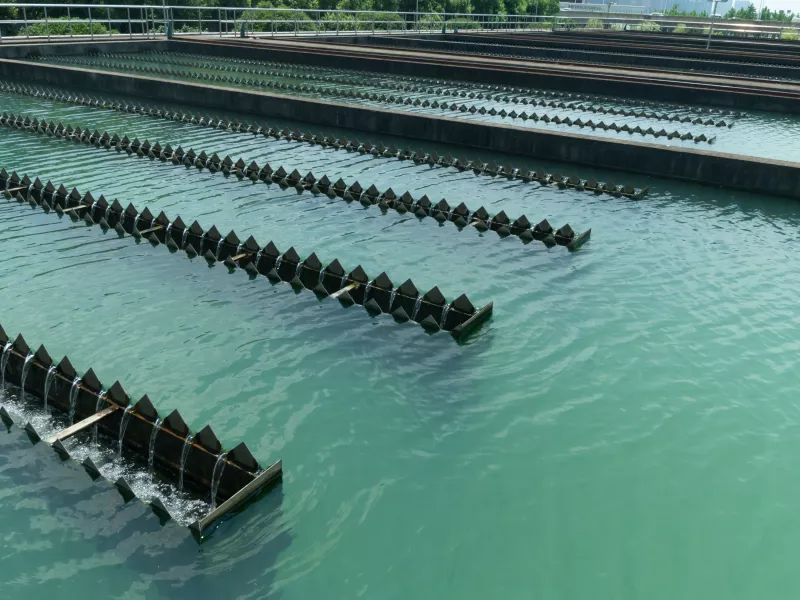 Tank rotators in open water basin