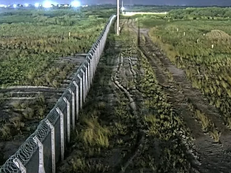 Night time image of fence line at Ferroport