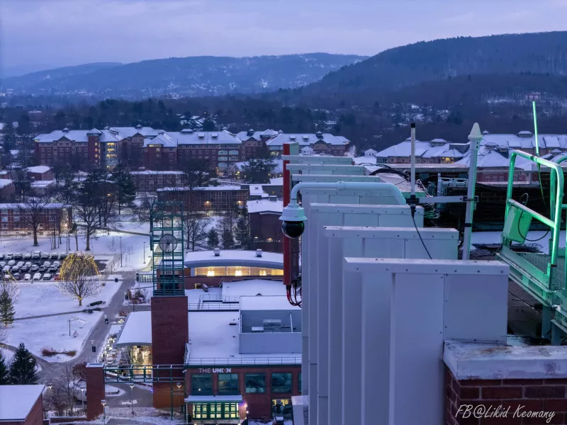 Picture of Axis camera deployed atop a building at Binghamton University