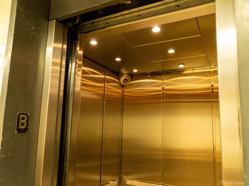 Corner mounted camera inside elevator at Binghamton University