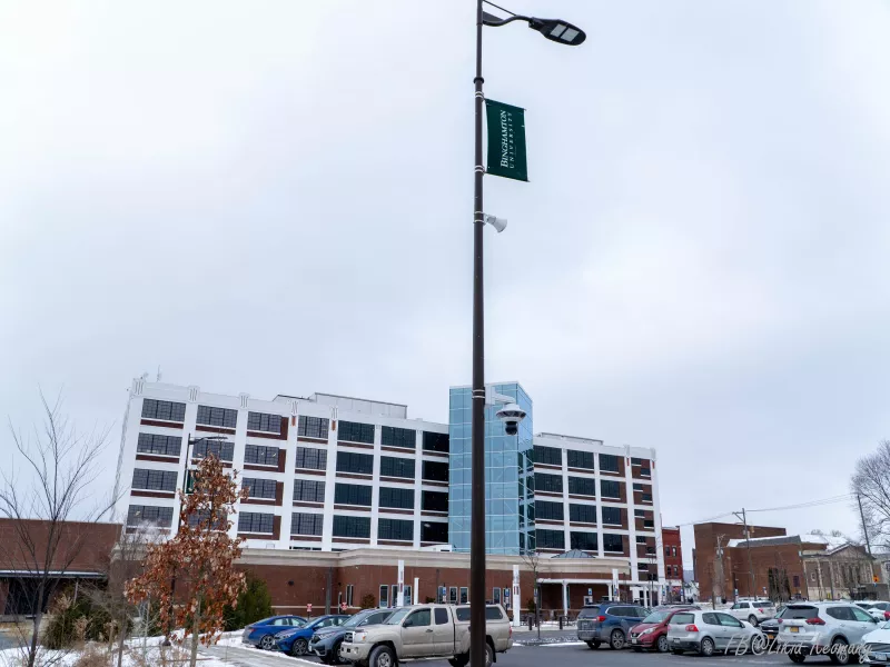 Camera on pole in parking lot at Binghamton