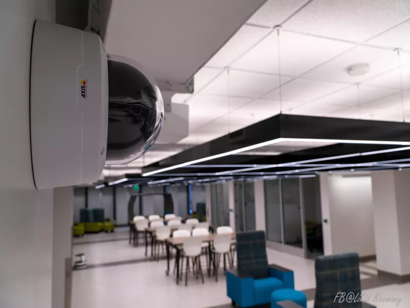 Wall mounted camera in university setting