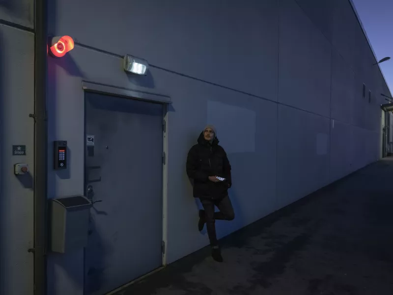 strobe siren red man wall