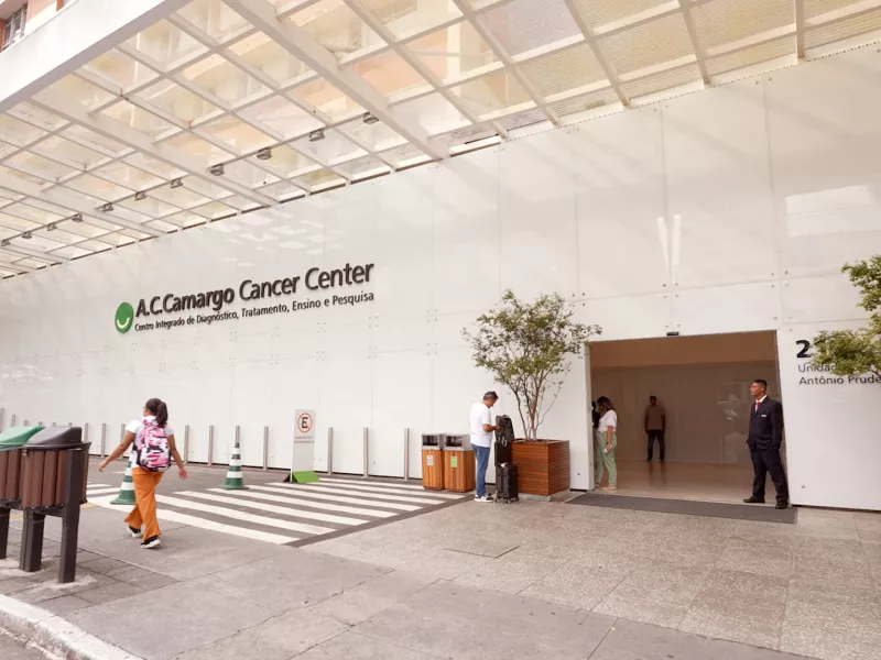 Wide shot of hospital lobby with signage