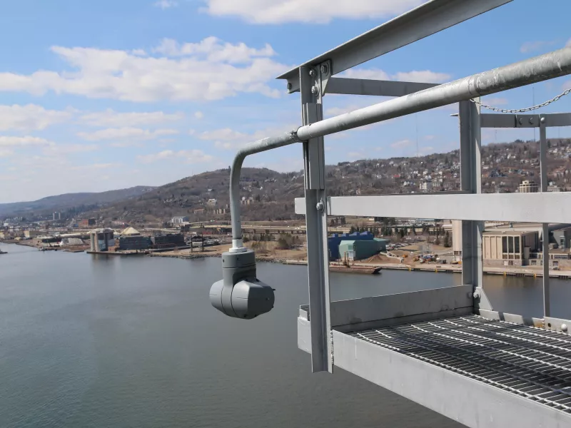 Q61 PTZ hanging from aerial bridge 