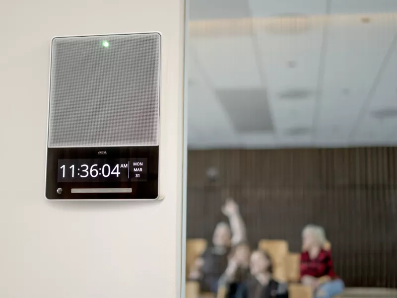 AXIS C1710 installed outside an auditorium