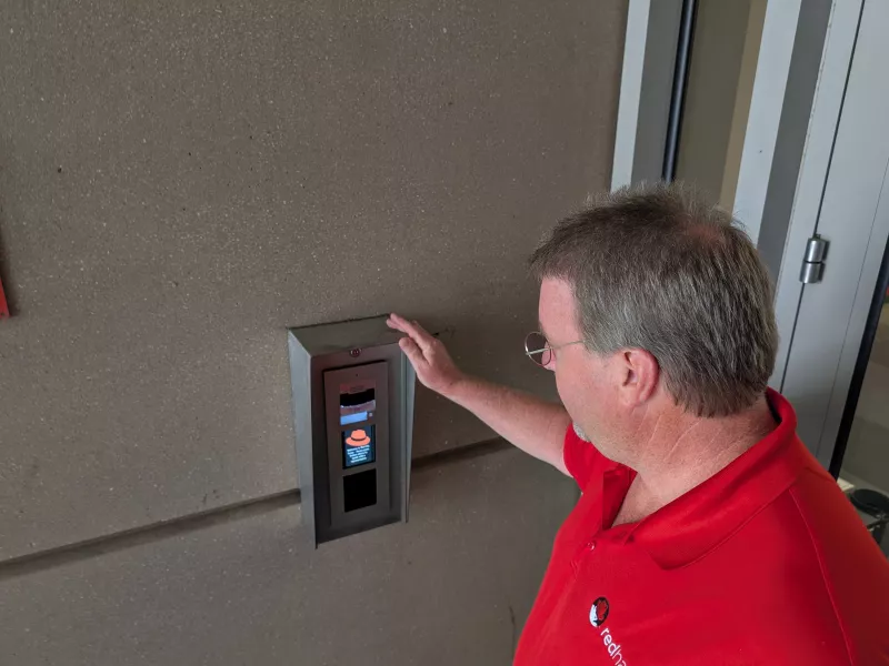 Red Hat employee using intercom