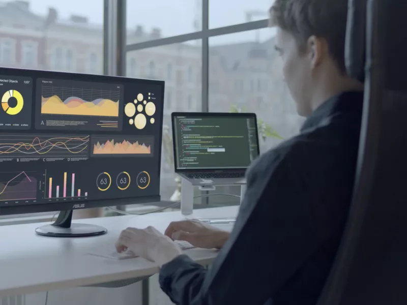 Person sitting in front of screen displaying a Dashboard showing various data sources