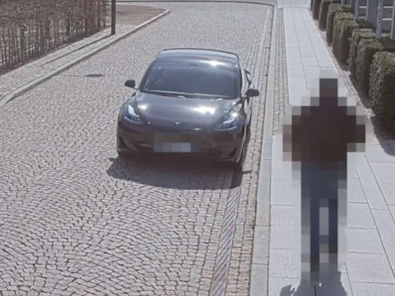 Car and person masked for privacy