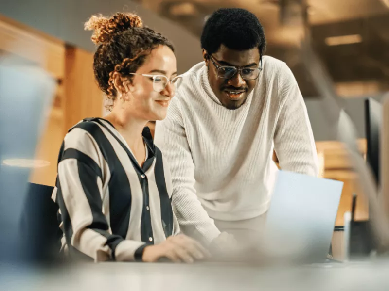 Professionals collaborating in a modern office setting.