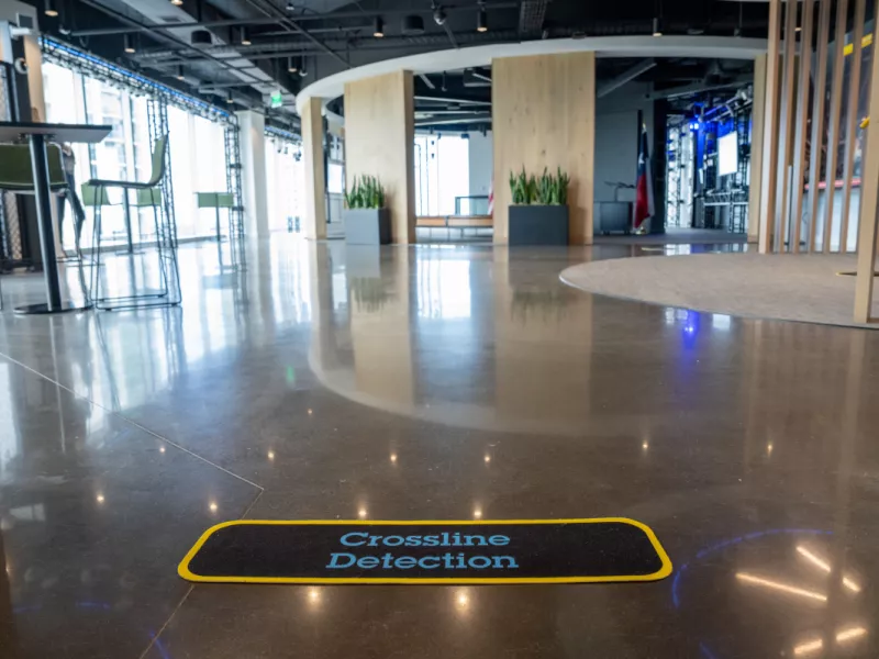 Dallas Axis Experience Center Crossline Detection entrance showcasing Axis intelligent video analytics and advanced security monitoring technology.