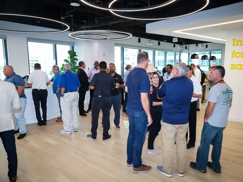 Fort Lauderdale Axis Experience Center grand opening event celebrating the launch of the facility and showcasing advanced security solutions and technology demonstrations.