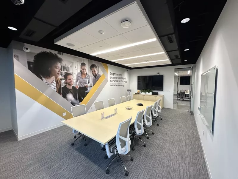 Minneapolis Axis Experience Center conference room equipped for meetings and presentations, providing a professional space to explore advanced security solutions and technology demonstrations.