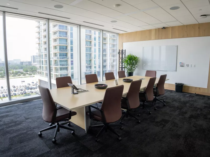 “Dallas Axis Experience Center Mavericks Conference Room designed for strategic meetings and collaboration using advanced Axis security technology.