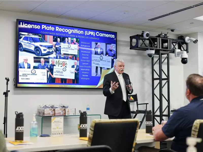 Keynote speaker Jim Glasgow presenting at the Securing Tomorrow event, highlighting advanced security solutions and innovative technologies for protecting facilities.