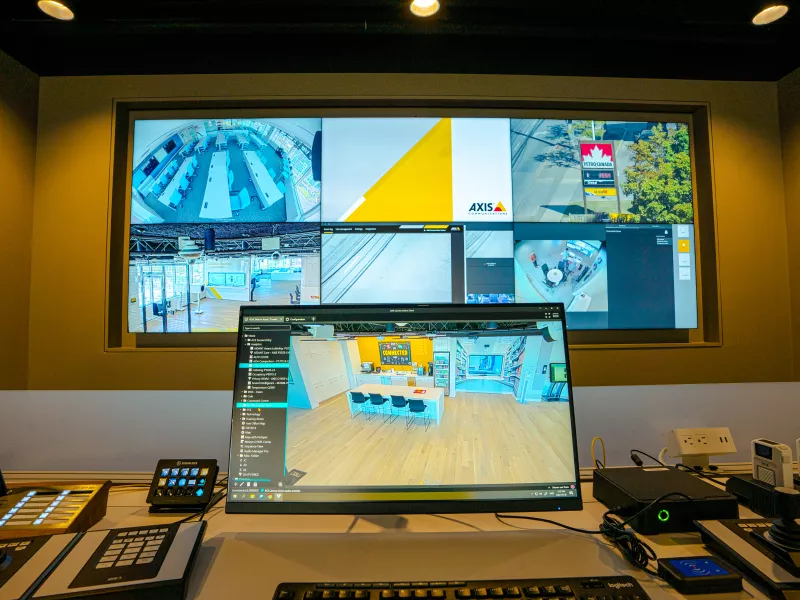Command center at the Mississauga Axis Experience Centre featuring advanced network security monitoring, video management systems, and real-time surveillance technology.