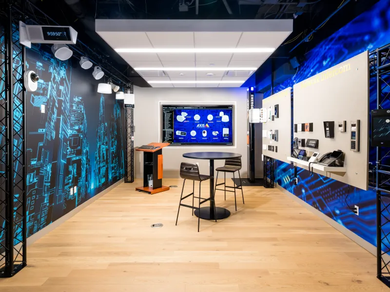 Network access control and network intercom wall at the Houston Axis Experience Center showcasing integrated security and access management solutions