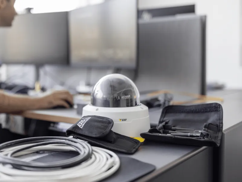 Developer with an Axis camera on desktop