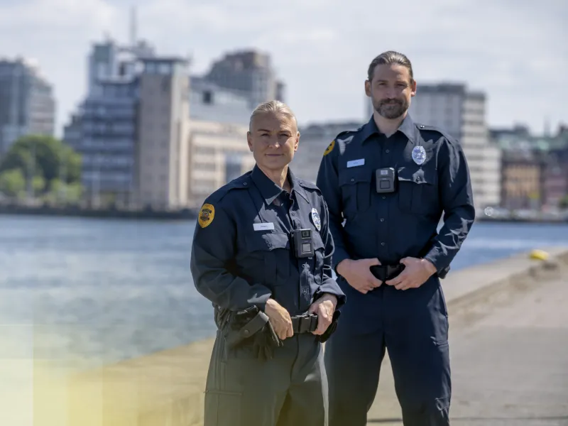 Two police officers wearing AXIS W102 Body Worn Camera