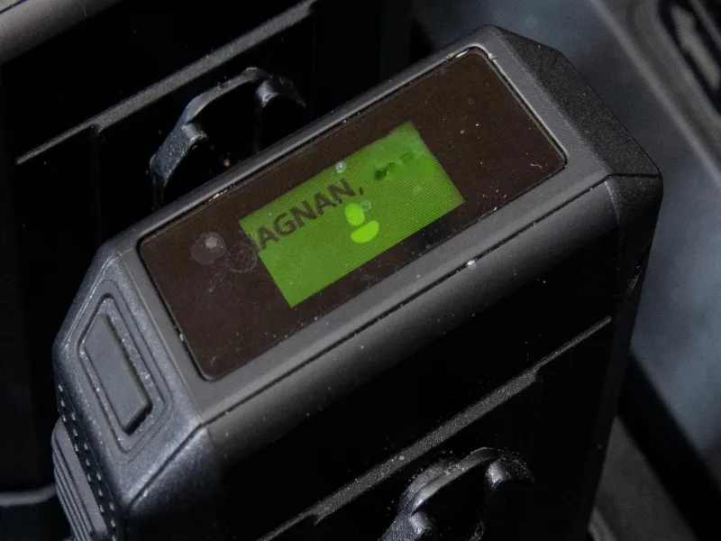 Camera in dock with officer name partially visible