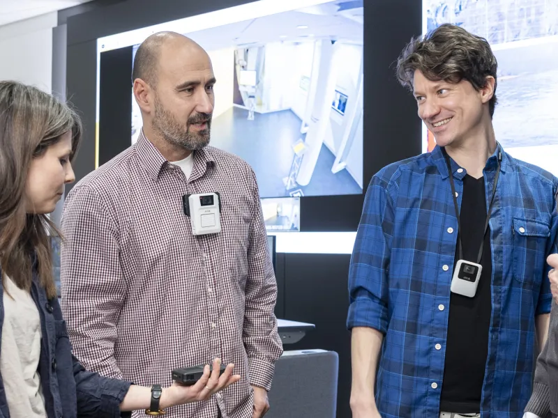 Johanna, Filip and Richard talking about a bodyworn camera 