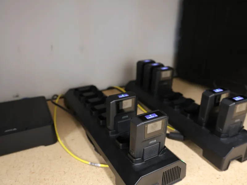 Axis body worn cameras in docking station
