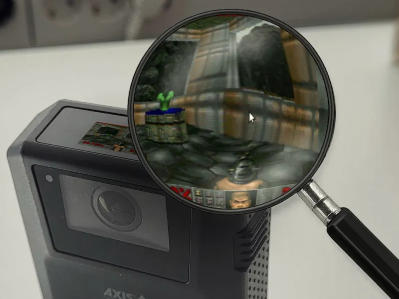Image of body worn and a magnifying glass showing Doom