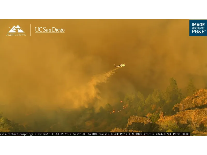 Fire retardant drop from plane on wildfires