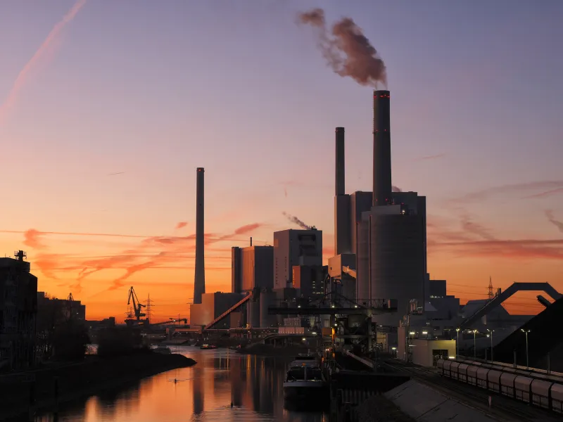 Sunset of power station by a canal