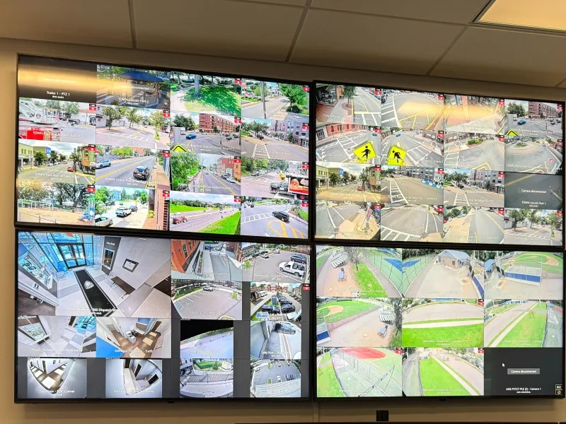 Close up of a monitor showing video streams