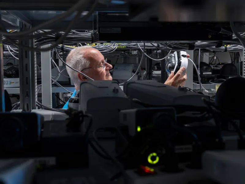 person looking at axis camera