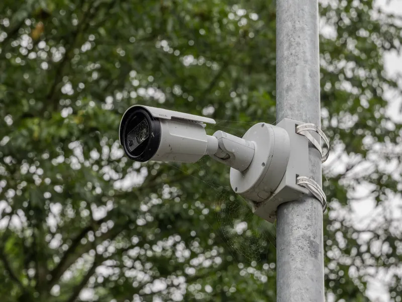 Axis license plate recognition camera mounted on a pole at a recycling centre