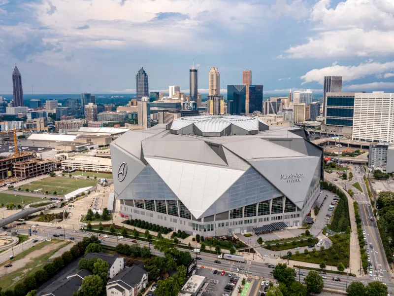 Aerial view of stadium with cityscape