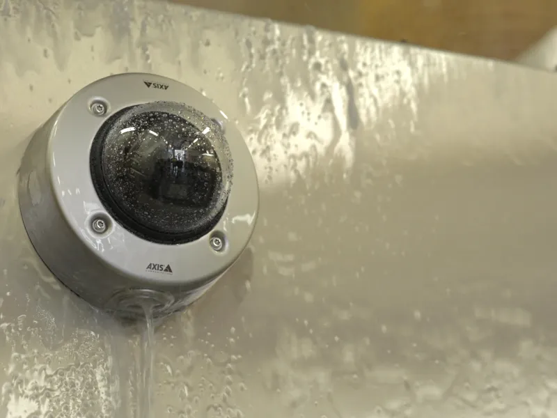 AXIS P3268-SLVE Dome Camera mounted on a wall in a cold environment.