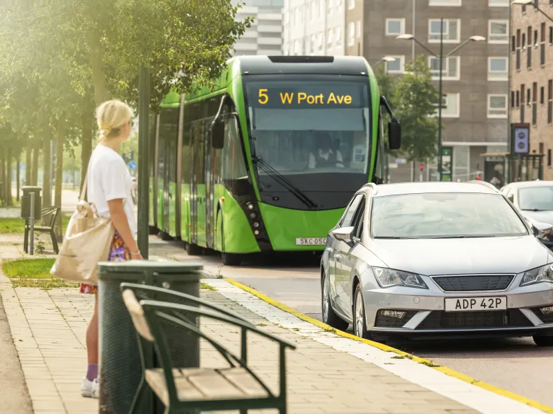 Bus by bus stop, onboard cameras