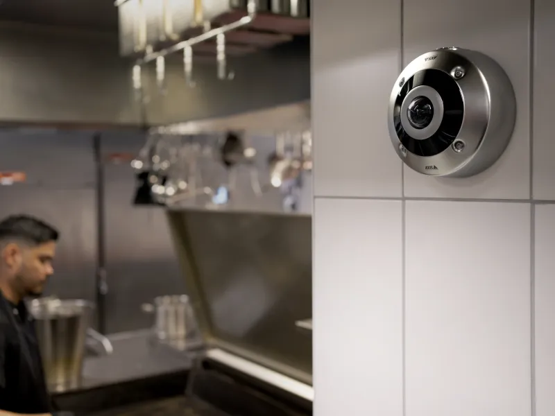 AXIS M4337-SPLVE Panoramic Camera mounted on wall in restaurant kitchen 