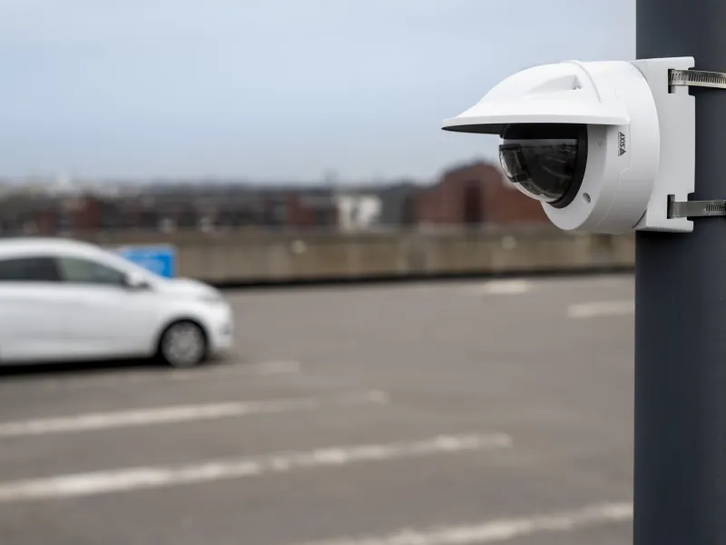 Dome camera mounted on pole on parking lot 