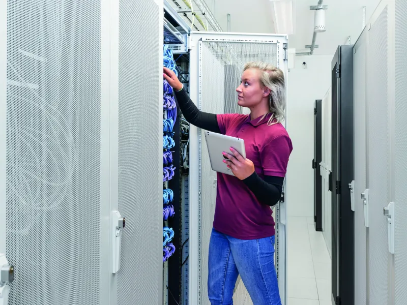 Female technician is checking a rack